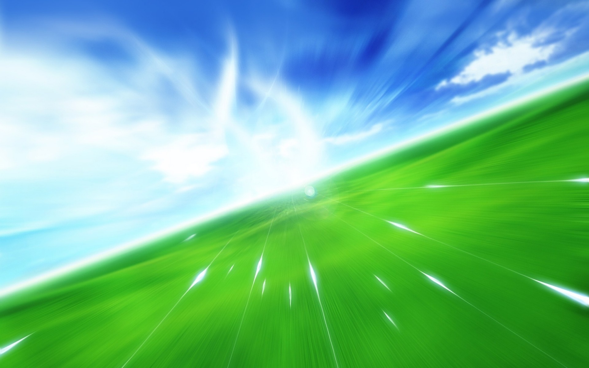 abstract blur sun bright light green fields blue sky