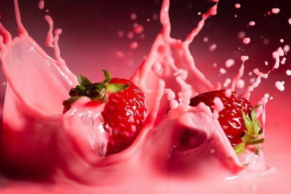 Strawberry dessert. Delicious strawberries. Pink splashes