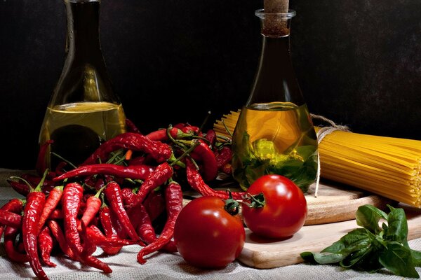 Gourmet set. Tomatoes, chili peppers and olive oil