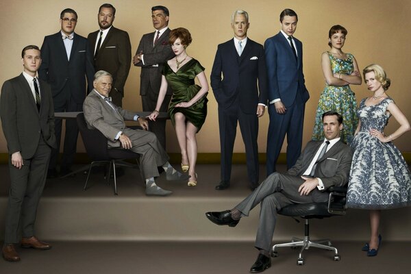 A TV series about business. Group photo of elegant heroes in business suits