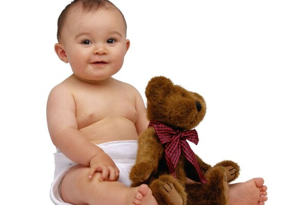 Süßes Baby mit Teddybär