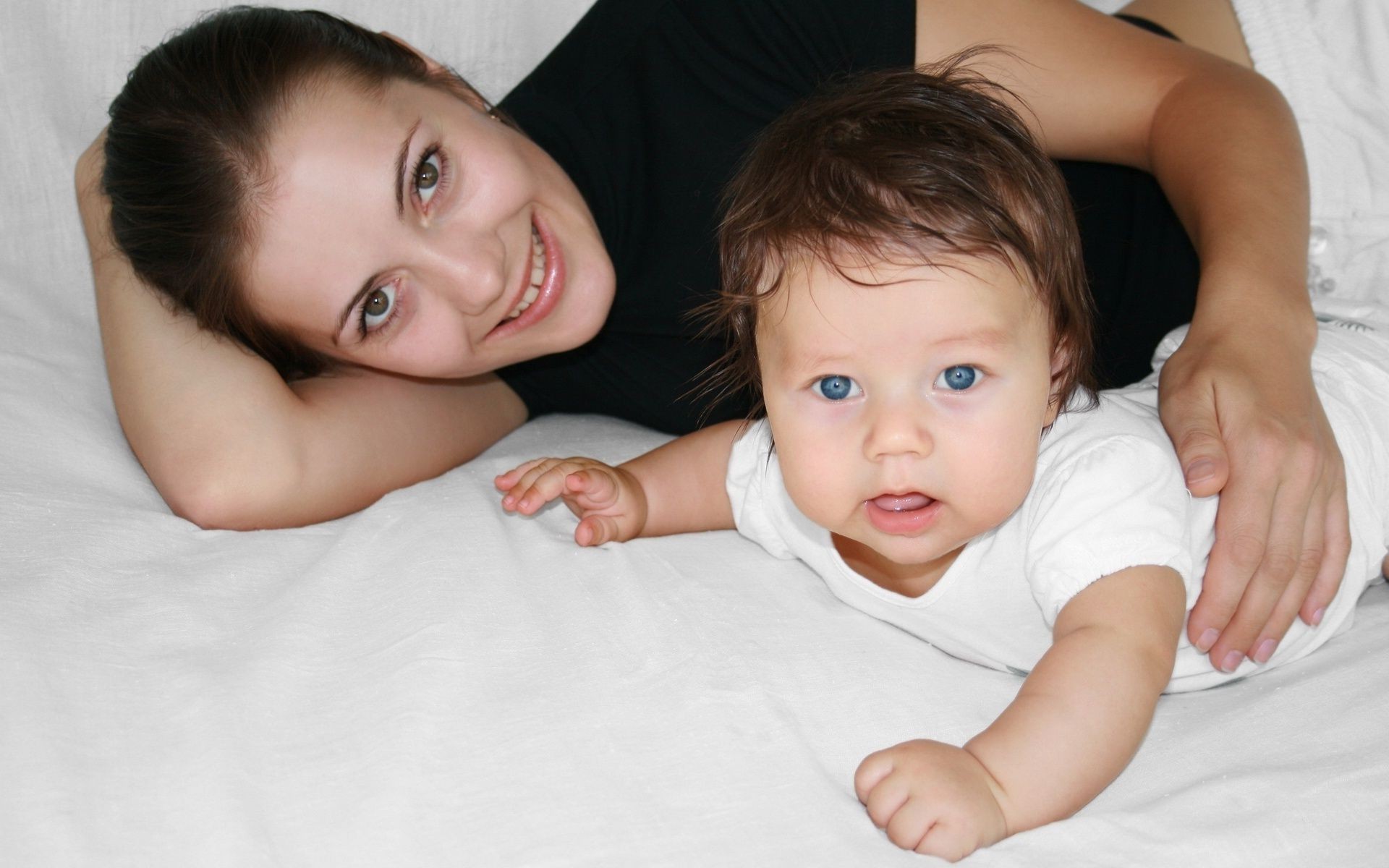 babies child baby boy cute bed little innocence girl family indoors newborn portrait reclining facial expression bedroom