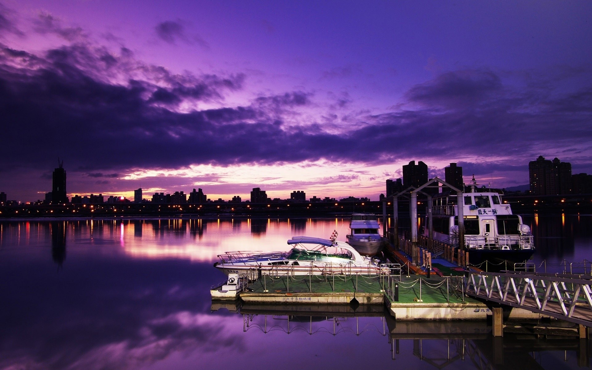 other city water travel reflection river city sunset architecture sky dusk evening bridge building pier outdoors waterfront harbor dawn cityscape watercraft