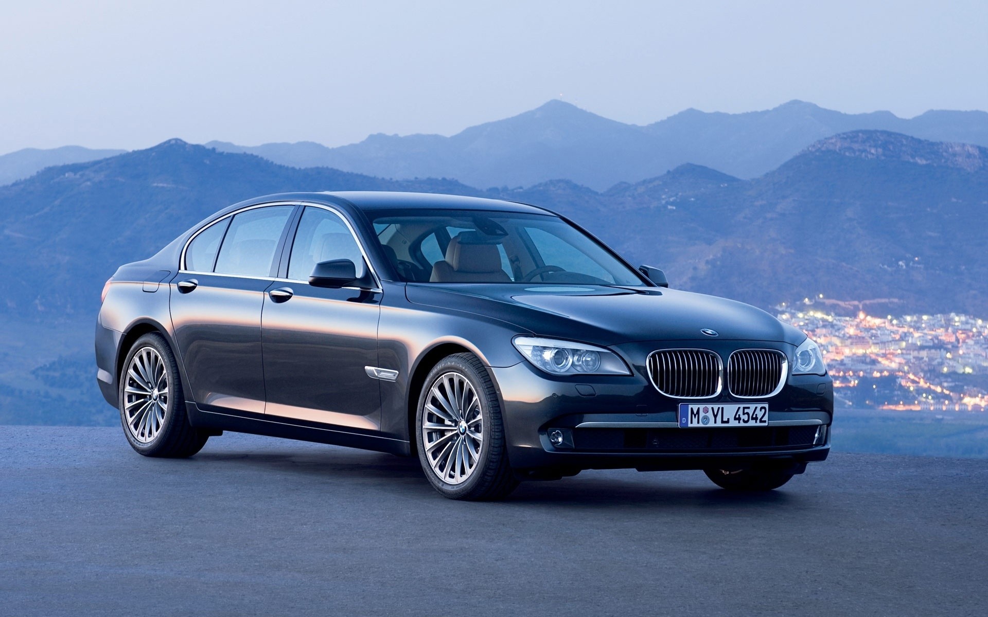 bmw car vehicle noon automotive blacktop transportation system wheel asphalt sedan fast coupe bmw 7 series