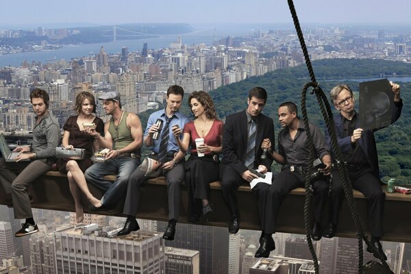 Poster for the TV series. The main characters are sitting above the city at the height of a bird s flight