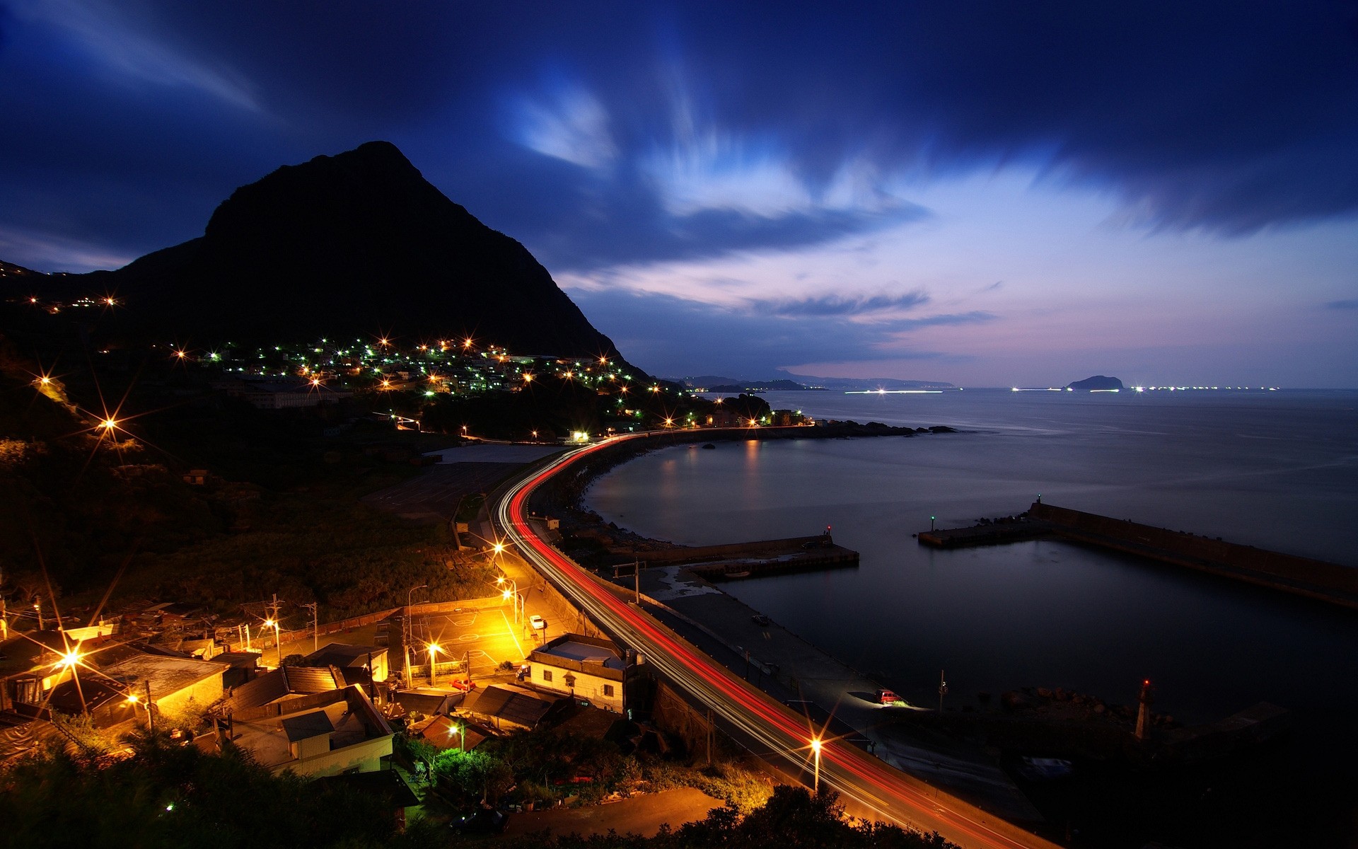 other city travel water evening dusk transportation system sunset vehicle city sea sky road bridge taiwan coast night