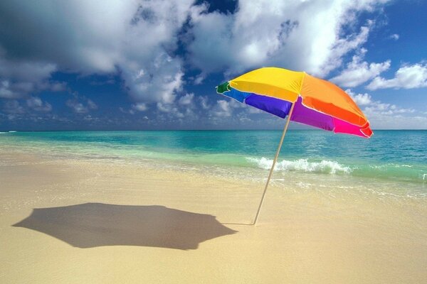 A lonely umbrella on the ocean