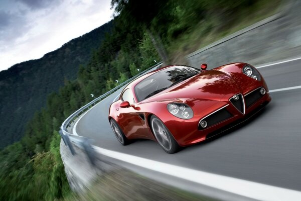 Red alfa romeo Car driving at high speed