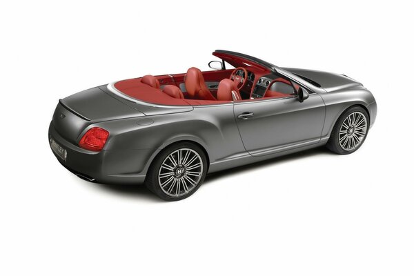 Grey Bentley convertible with red interior