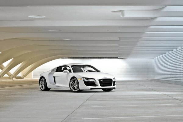 White Audi car in a futuristic setting