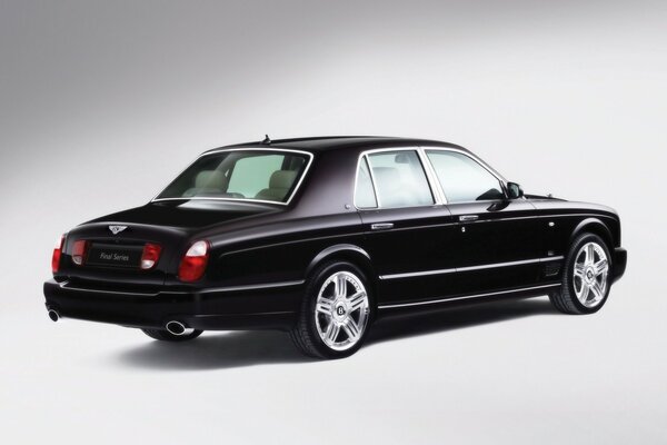 Black bentley car on a gray background