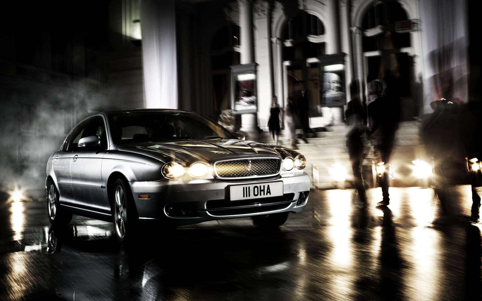 jaguar car street blur vehicle pavement road transportation system city jaguar x-type