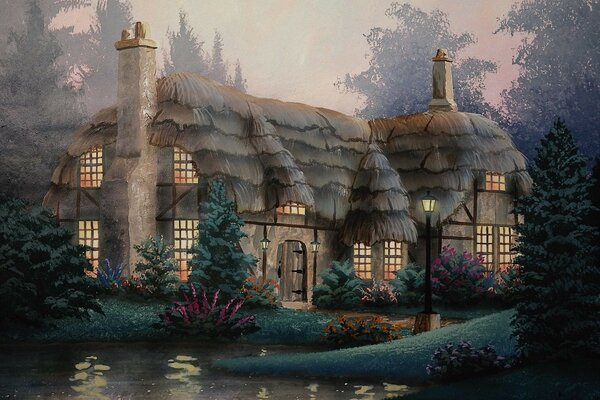 Fantasy house with lighted windows standing by the water