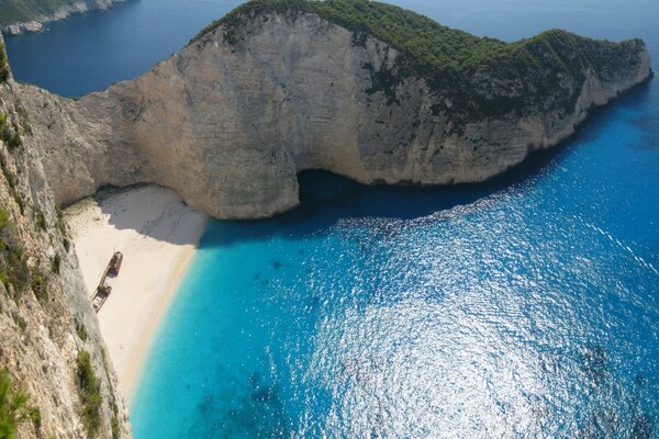 A huge cliff in the blue sea