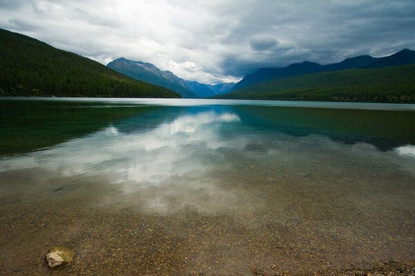 Reflection of the sky Igor in the lake