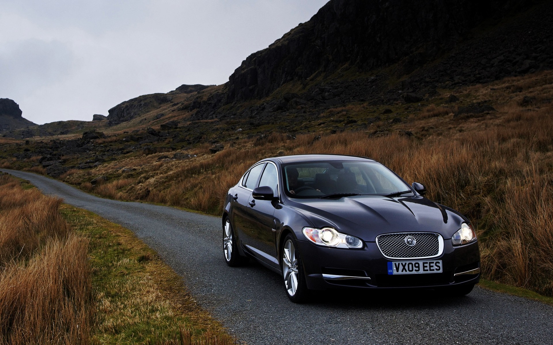 jaguar coche negro coche acera mediodía prisa carretera jaguar xf