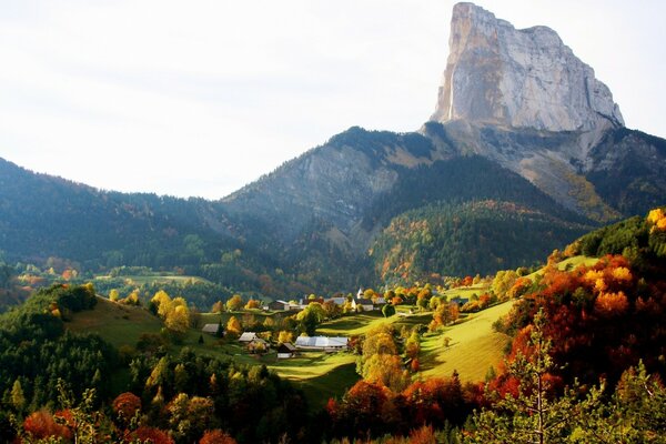 Autumn colors on the background of a mountain landscape