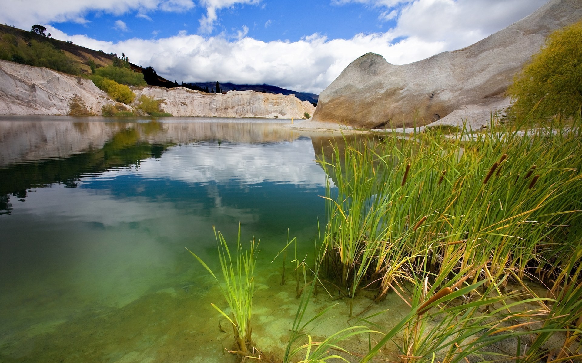 landscapes water landscape nature lake travel outdoors grass sky scenic summer dawn mountain reflection river wood rocks scenary