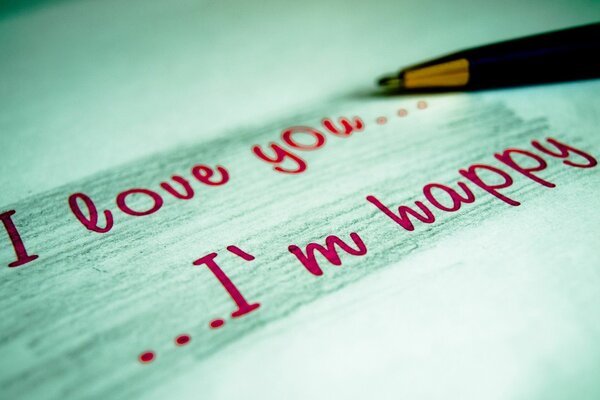 Red lettering on paper