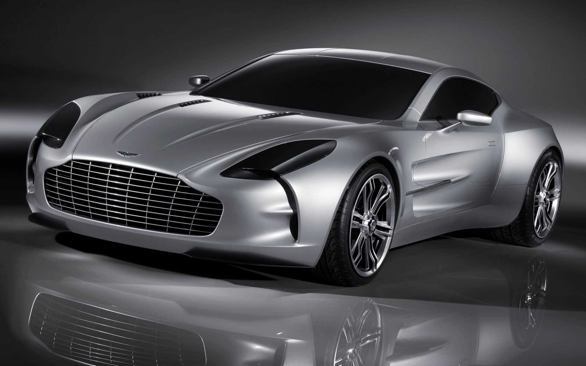 aston martin auto auto räder automobil coupé transportsystem antrieb limousine schnell motorhaube mittags bürgersteig chrom klassisch aston martin one