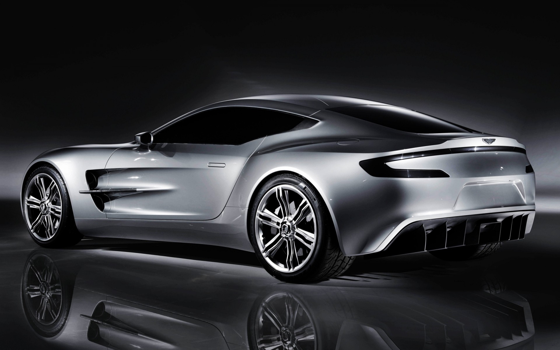 aston martin araba araba otomotiv coupe sedan tekerlekler öğlen sürücü hızlı kaput göster ulaşım sistemi prototip siyah krom lüks aston martin bir