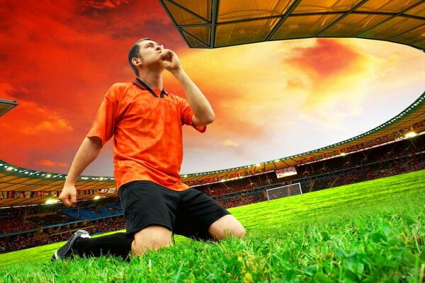 A young football player at a stadium with a beautiful sky