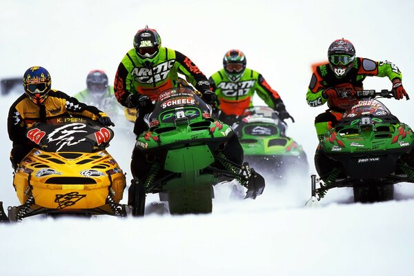 Sports snowmobile race color photo in the afternoon