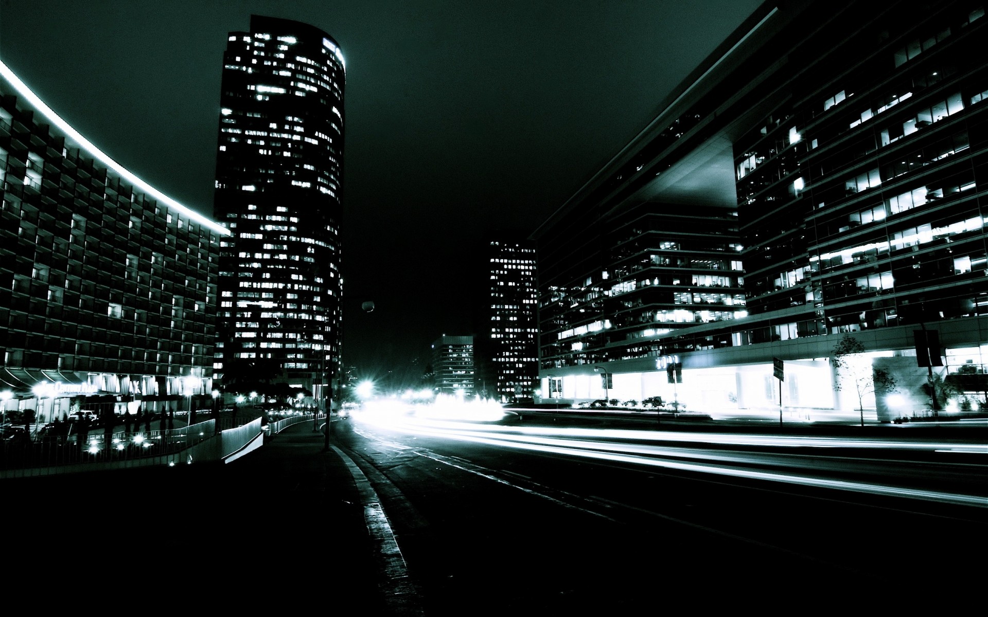 other city city urban street downtown building blur light fast architecture transportation system skyscraper motion road monochrome dark modern bridge perspective car tunnel town background night buildings