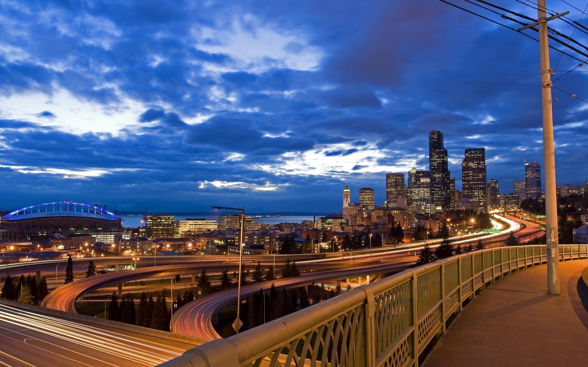 other city travel city dusk building cityscape architecture bridge skyline urban sky downtown transportation system evening road traffic skyscraper sunset modern highway street streets buildings lights town night