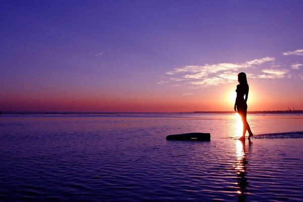 Dawn on the background of a beautiful girl