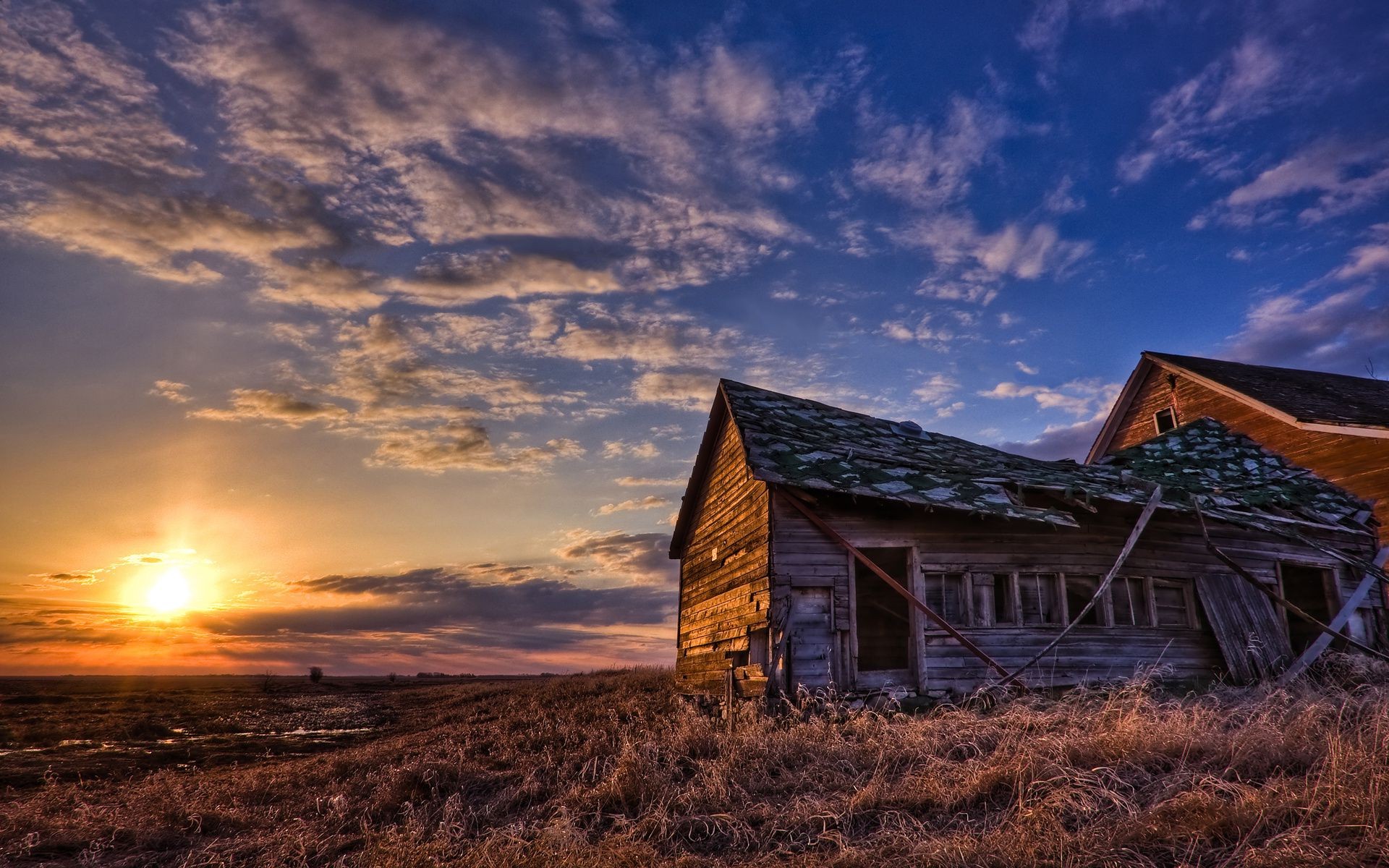 the sunset and sunrise sunset dawn barn sky farm landscape evening dusk sun outdoors rural light