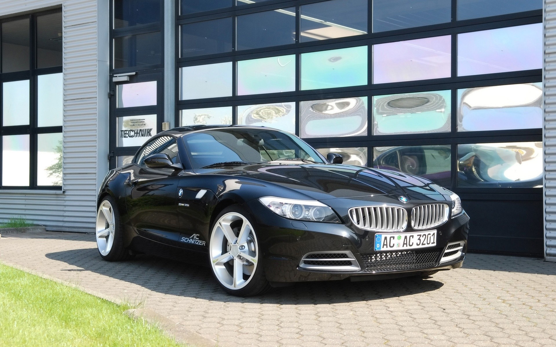 bmw voiture voiture chaussée système de transport roues automobile asphalte exposition luxe midi coupé noir voiture bmw z4 à louer