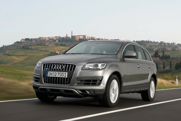 Avudi s silver car on a flat road