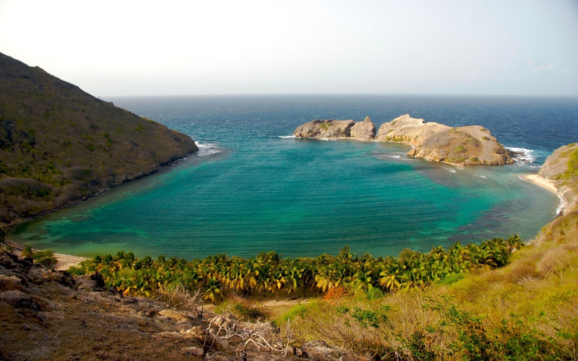 spazio acqua mare viaggi mare spiaggia oceano natura paesaggio cielo paesaggio all aperto isola estate scenico baia roccia vacanza sabbia luce del giorno sfondo