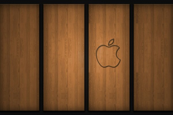 Apple sign on a wooden background