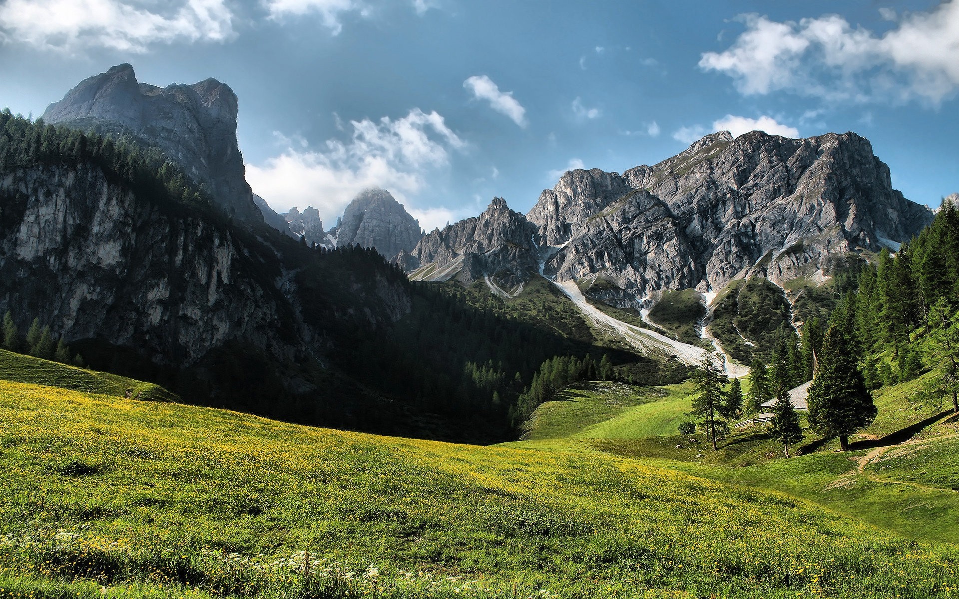 paesaggio montagna viaggi paesaggio all aperto natura cielo valle scenico erba picco di montagna estate roccia luce del giorno legno trekking sfondo alberi