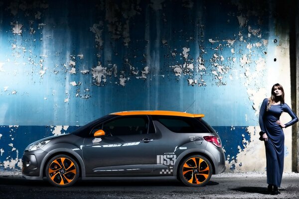 Beautiful girl at the Citroen ds3 car