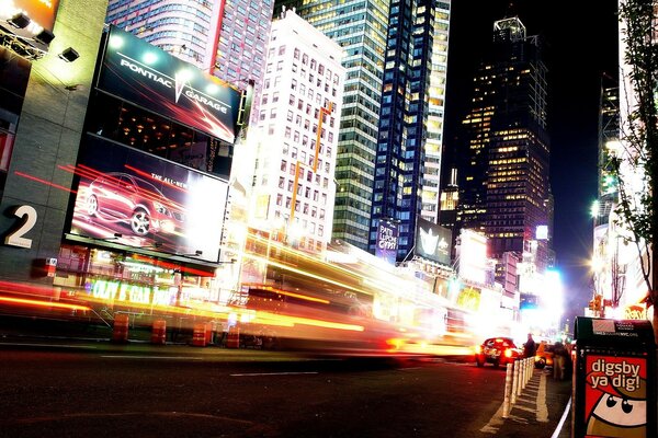 Night city with passing cars