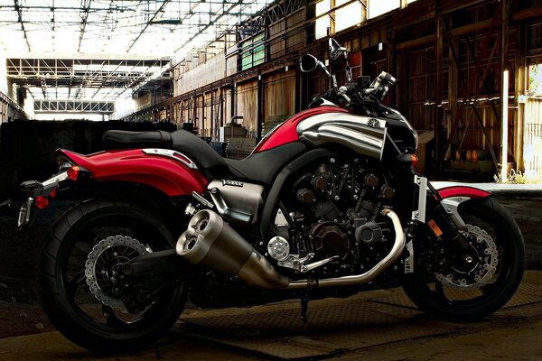 Motorcycle in an abandoned room during the day