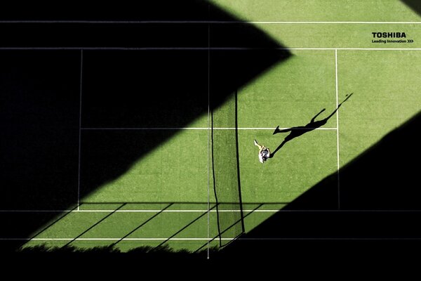 A man on the court playing tennis