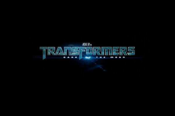 Қара фонда transformers жазуы