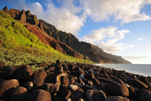 A coastal beach against a bright sky