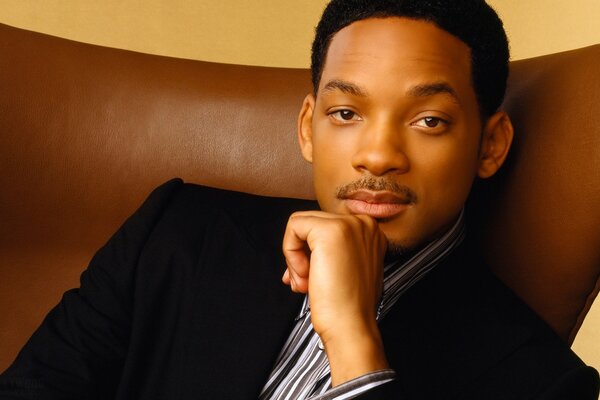 Foto von Will Smith im Jackett mit Schnurrbart