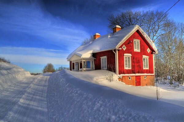 Cozy rustic house by the winter road