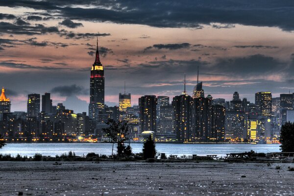 Evening skyscrapers of the USA by the water