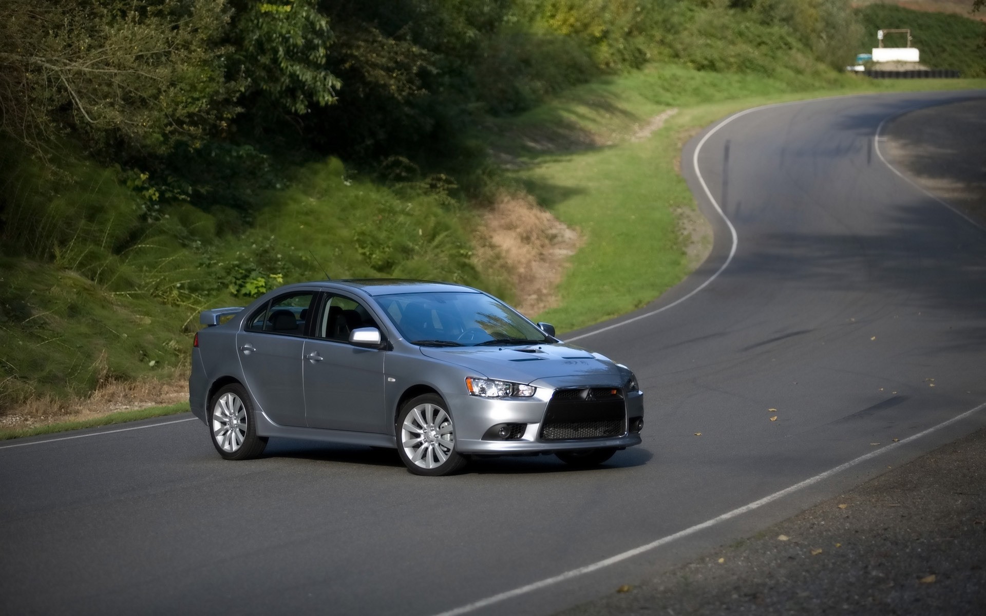 mitsubishi coche asfalto negro carretera prisa acera coche sistema de transporte acción rápido mediodía unidad desenfoque automotriz mitsubishi lancer