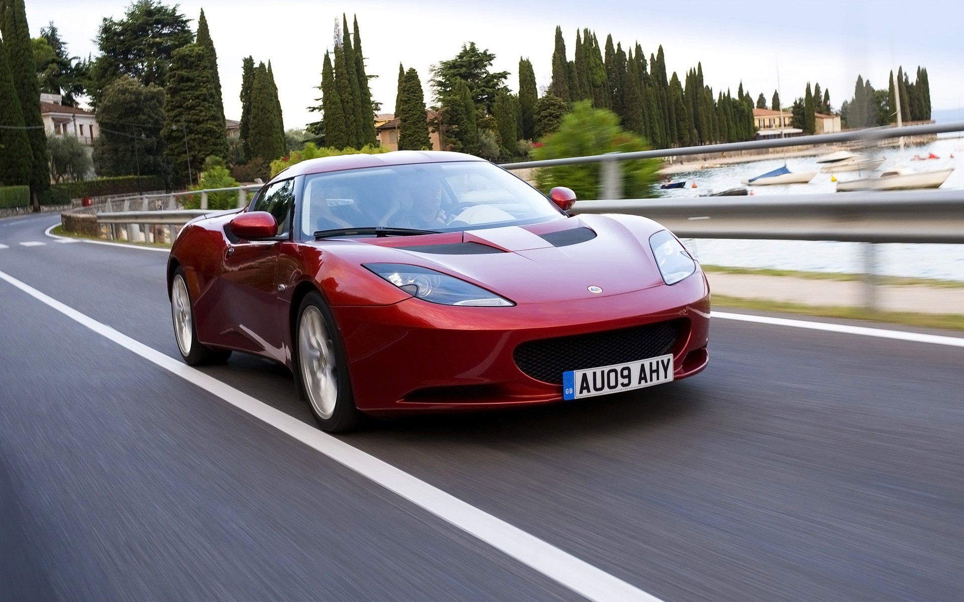 lotus auto fretta asfalto veloce auto nigella sfocatura azione corsa sistema di trasporto marciapiede disco strada lotus evora