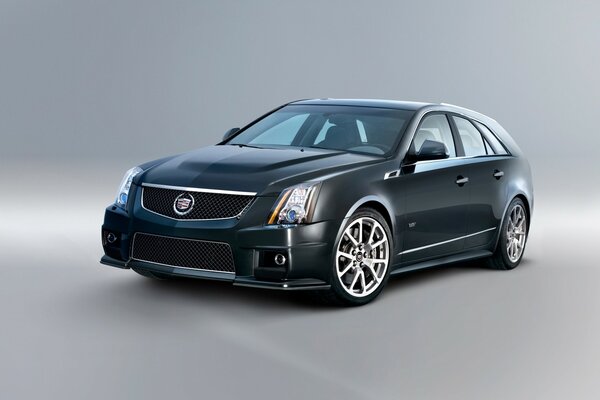 Black Cadillac on a gray background