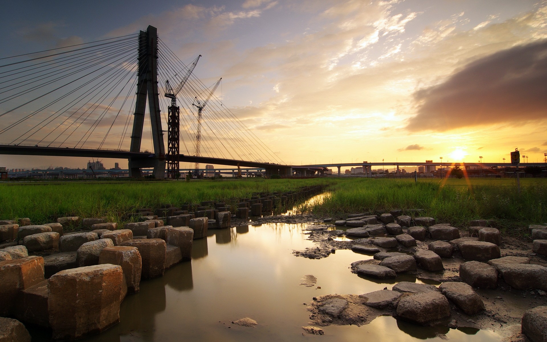 landscapes water sunset dawn river bridge sky landscape evening architecture nature travel reflection sea light outdoors lake dusk beach stones rocks