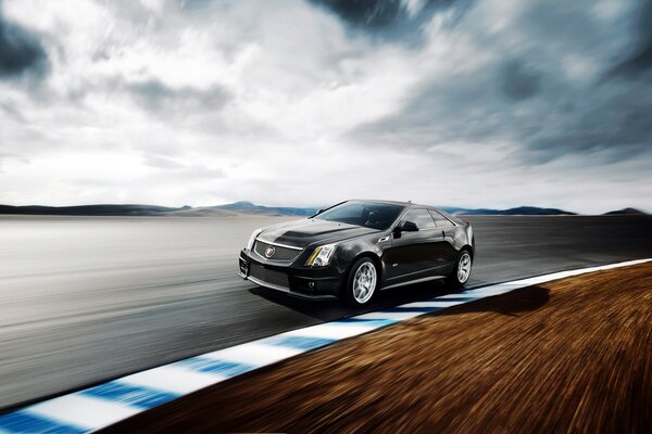 Black Cadillac on the highway